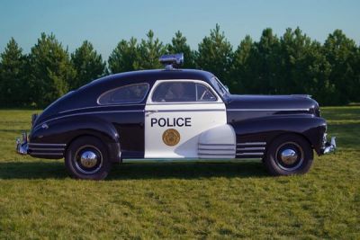 Samochód do ślubu - Śrem czarny Chevrolet Fleetline Police 3.0